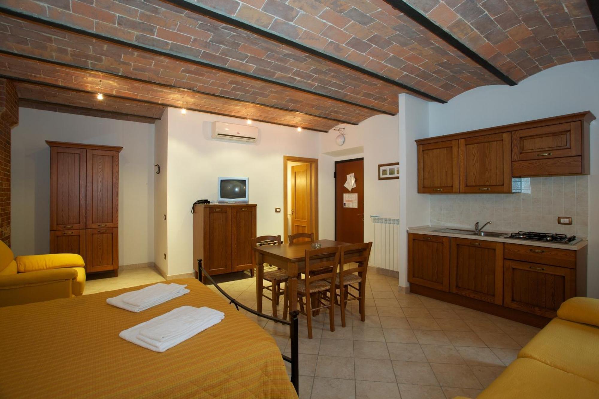 Oasi Del Grillo Aparthotel Кастелнуово Берарденга Стая снимка